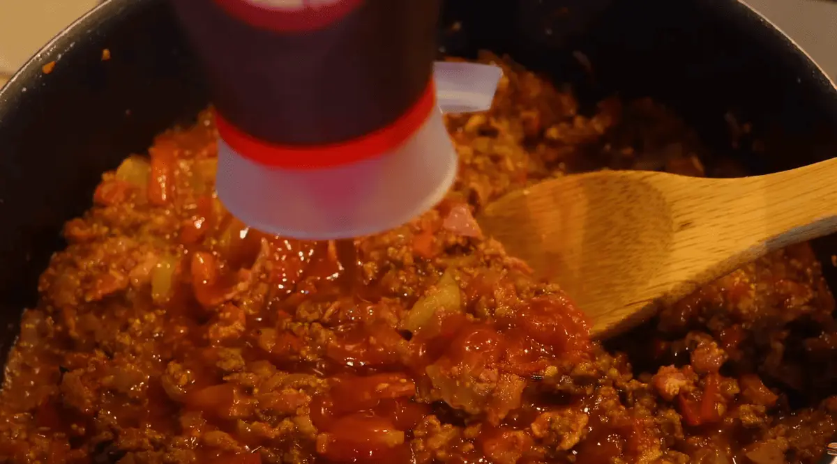 Step 4: Add 2 tbsp ketchup (or crushed tomatoes), 1