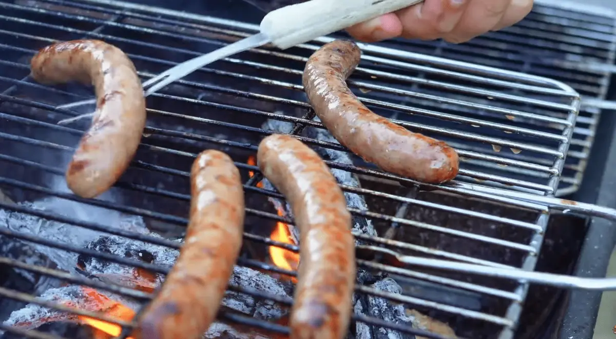 Step 6: Cook the hot dogs while the sauce finishes.