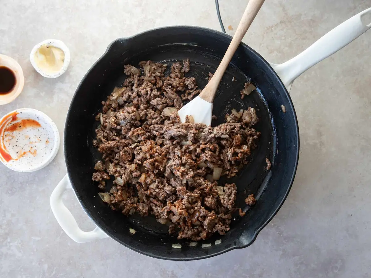 Step 3: Stir in the ketchup, 2 teaspoons of the