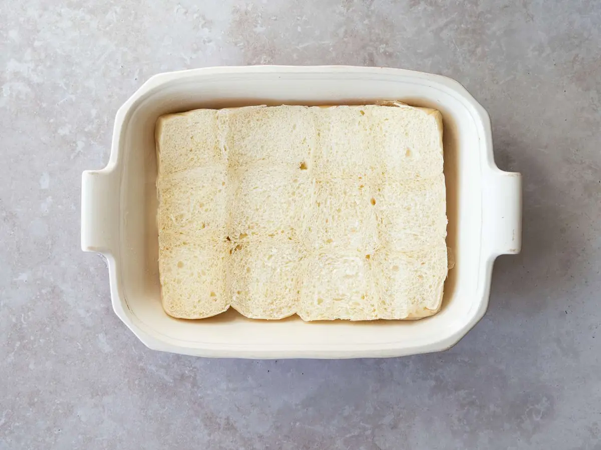 Step 4: Slice the whole slab of rolls in half