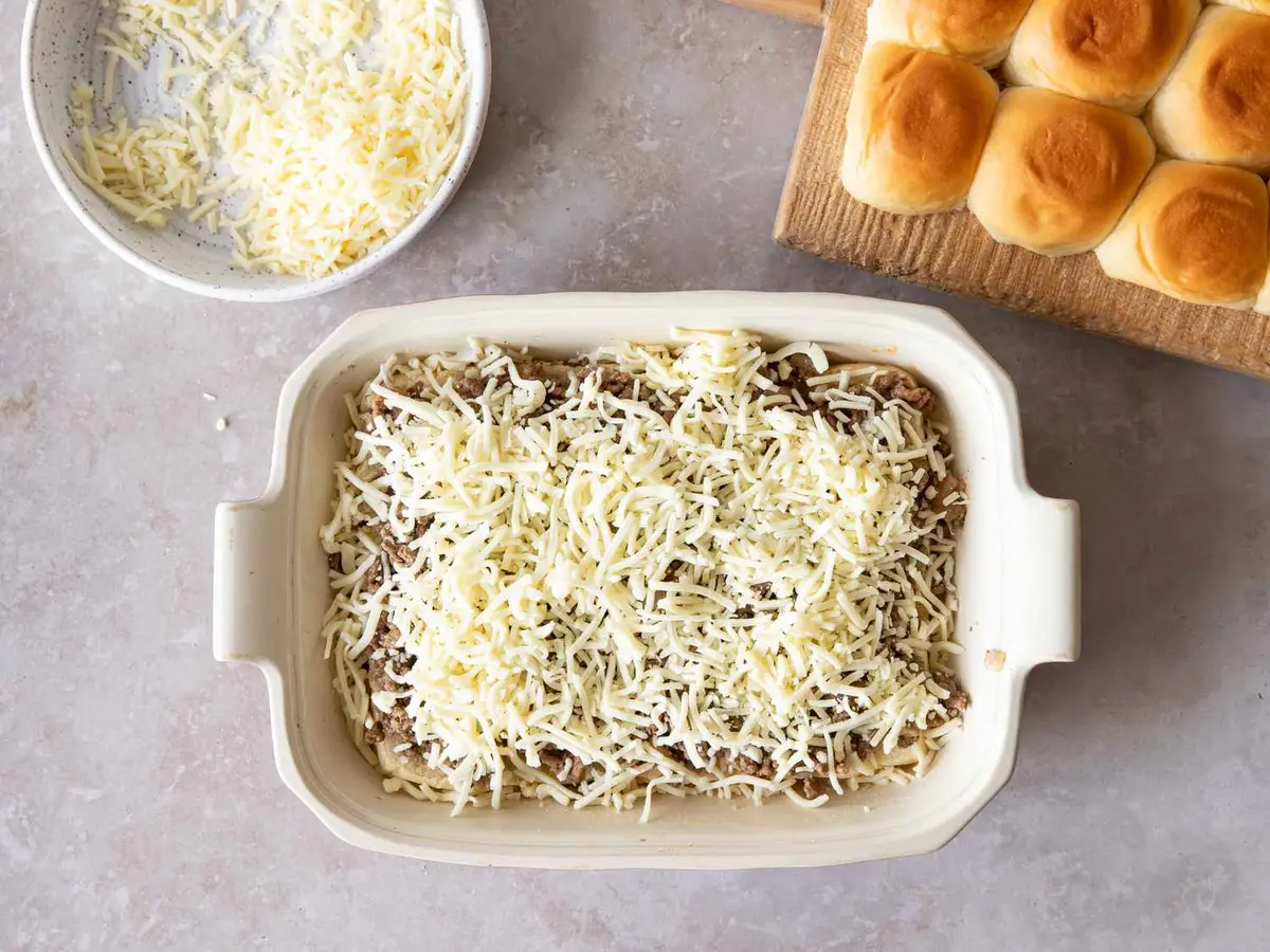 Step 5: Spread the beef over the rolls, cover with