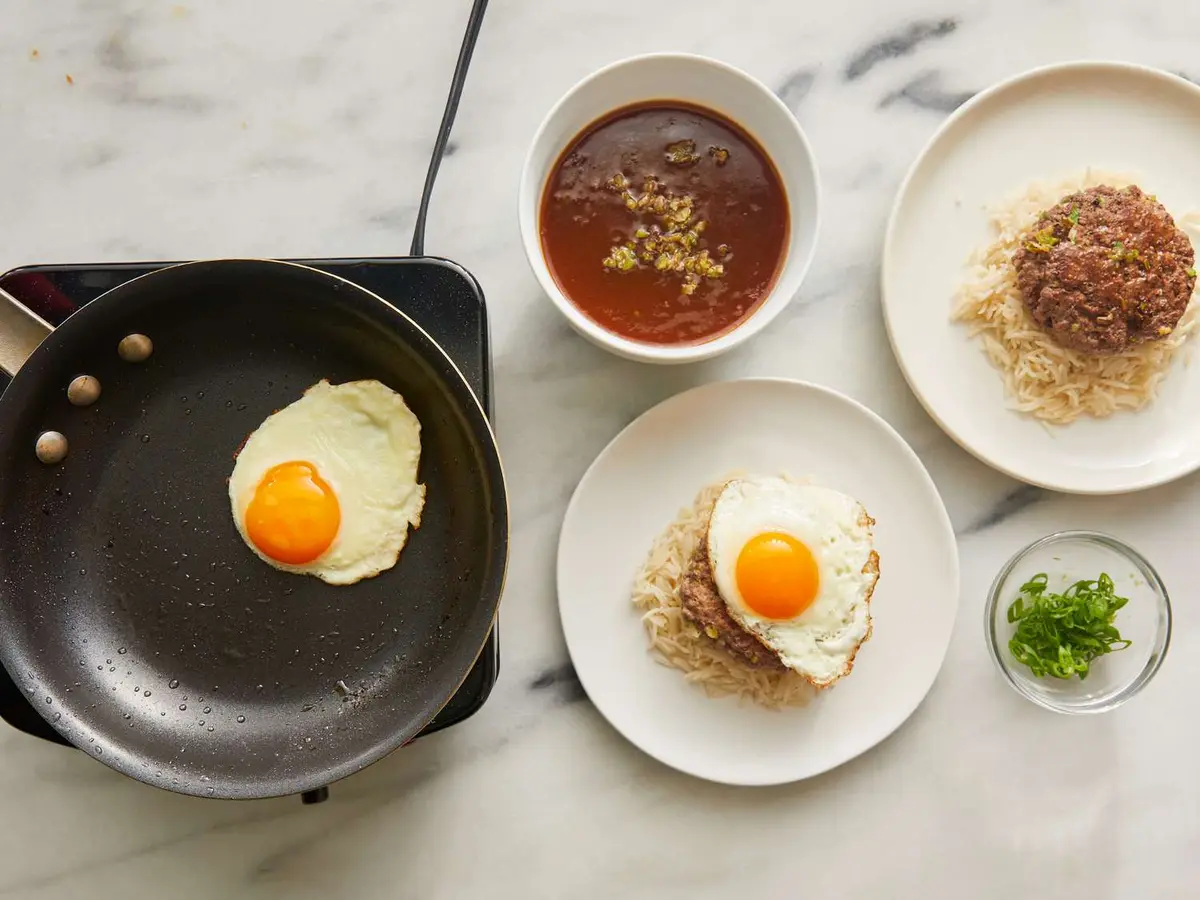 Step 6: Split the rice between 2 bowls. Set a