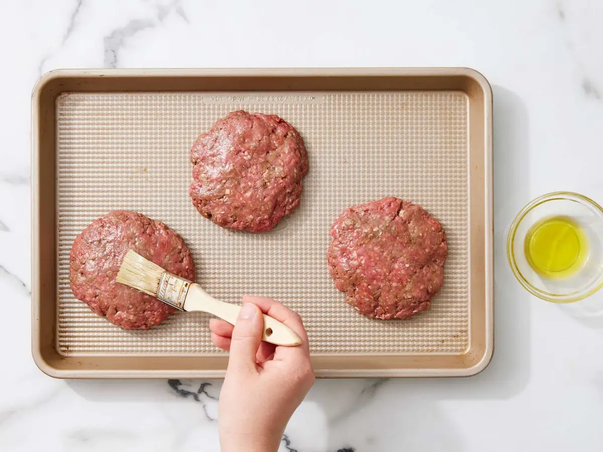 Step 5: Brush both sides of each patty with oil