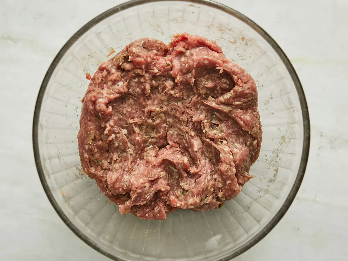 Step 2: In a large bowl, combine the ground lamb