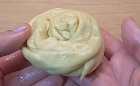 Step 2: Divide the dough into 2 balls. Roll each