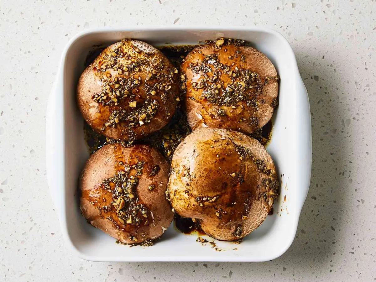 Step 4: Pour the dressing over the mushrooms and leave