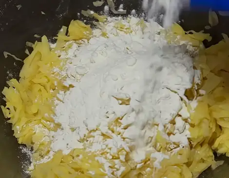 Step 1: Grate the potatoes on a coarse grater. Add