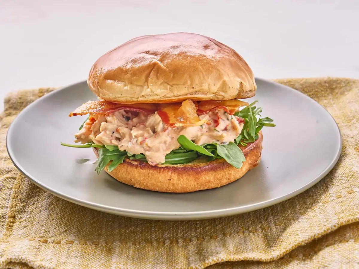 Step 4: Spoon the chicken onto toasted brioche buns and