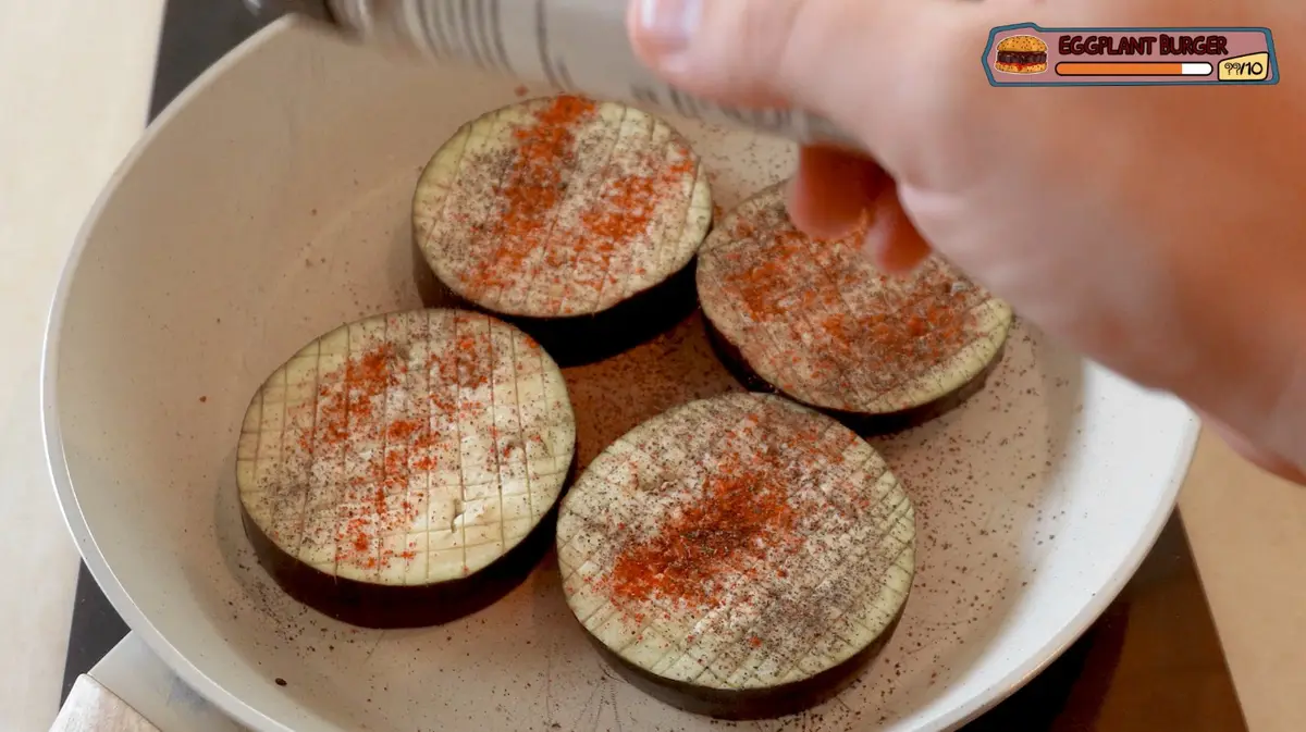 Step 3: Pat the eggplant dry and fry it. Season