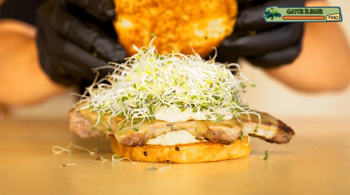 Step 5: Build: bottom bun, mango sauce, the patty, more