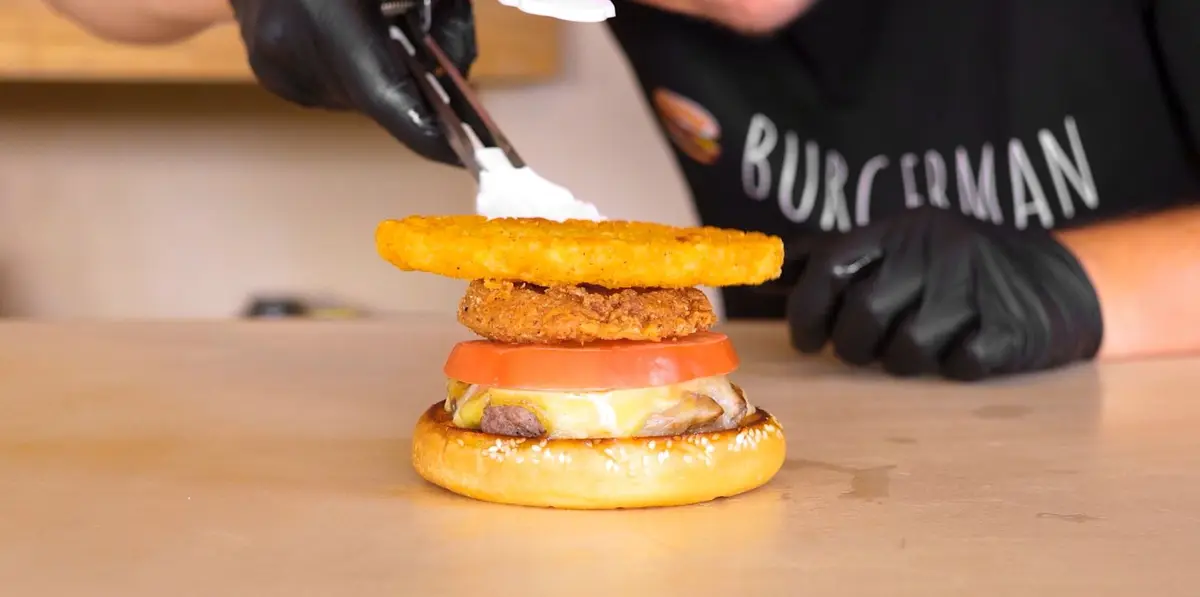 Step 6: Build on the bun: patty with the cheese,