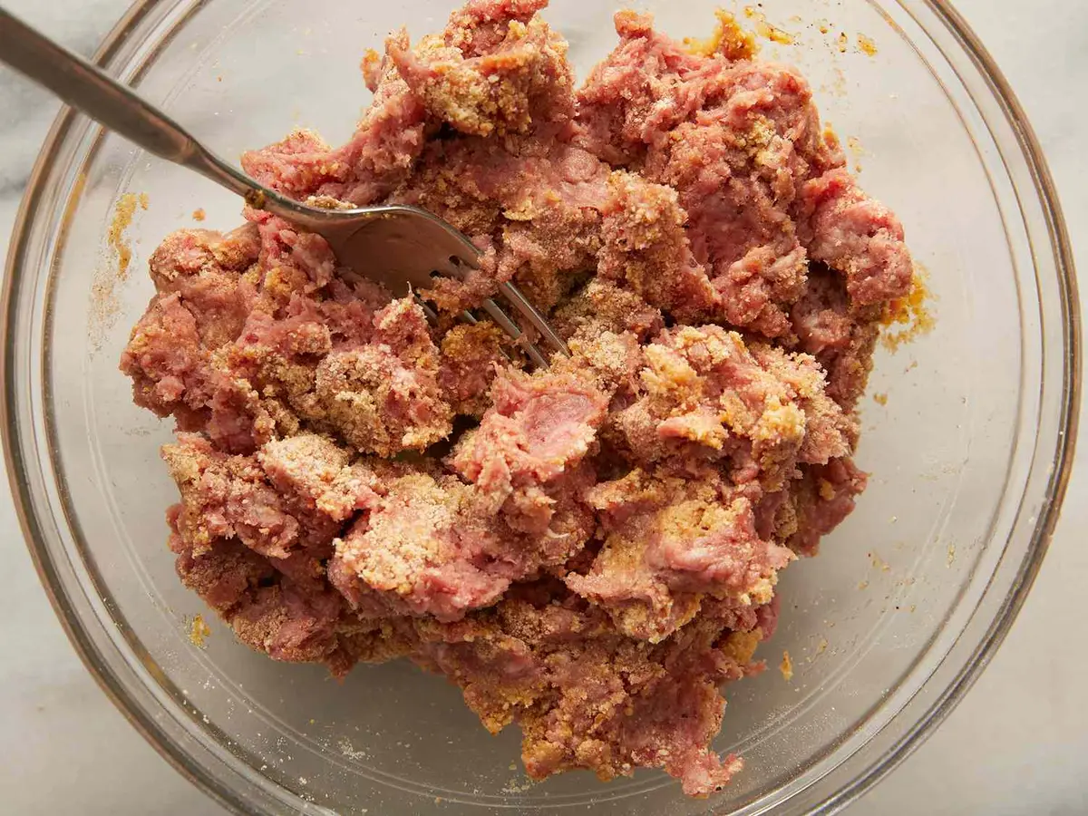 Step 3: Add the ground beef and bread crumbs and