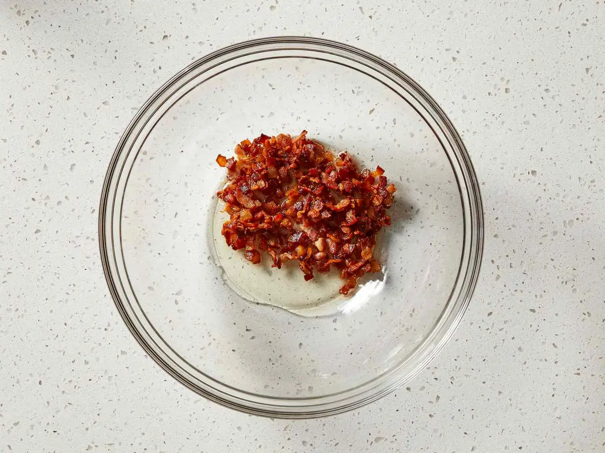 Step 3: Tip the bacon and its fat into a
